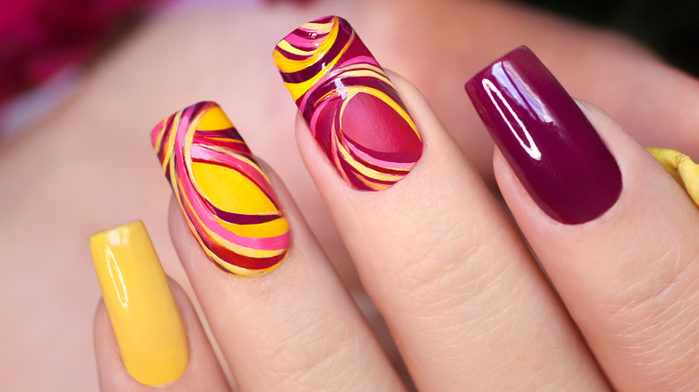 colorful manicure on fingernails