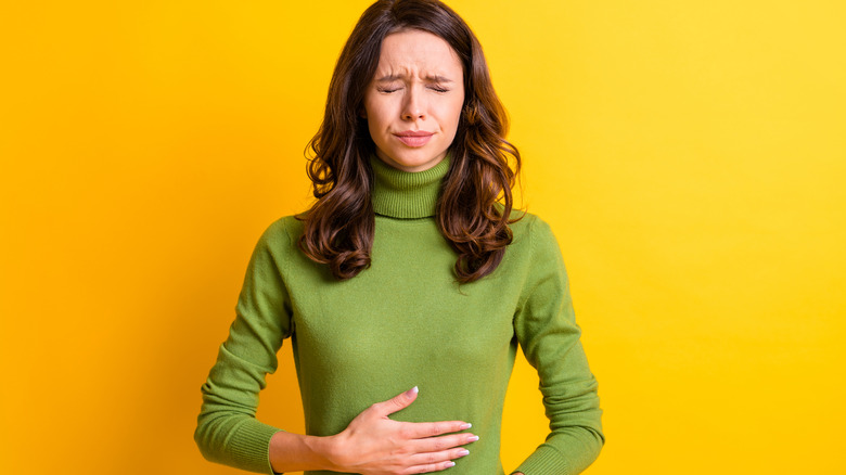 woman feeling nauseous