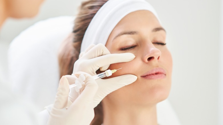 woman getting botox injection