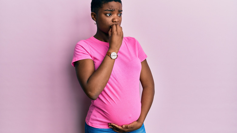 concerned pregnant woman