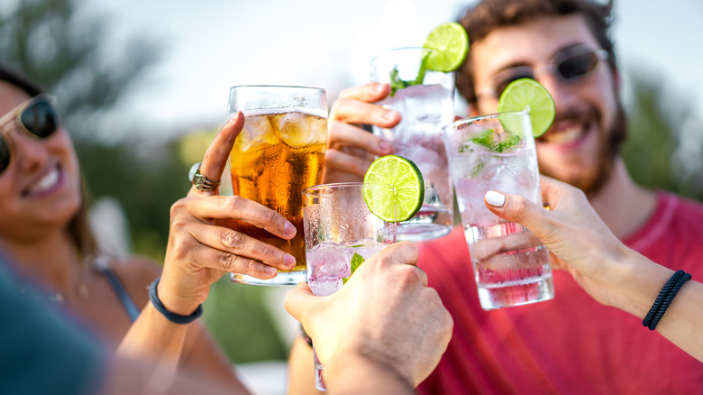 Friends celebrating with drinks