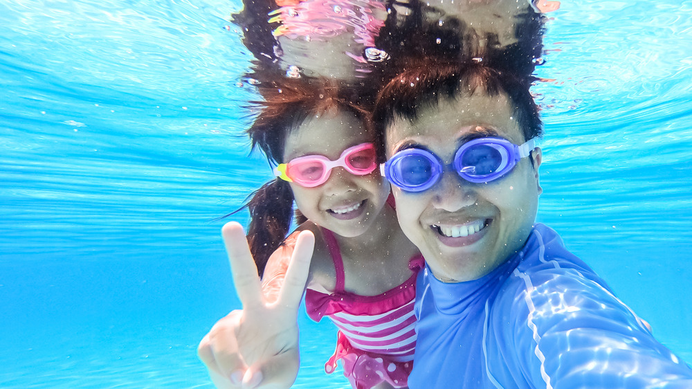 Parent and child with goggles