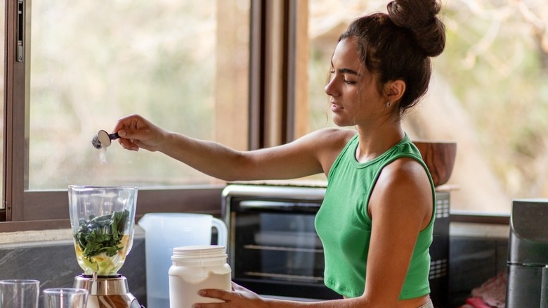 Lady making a smoothie