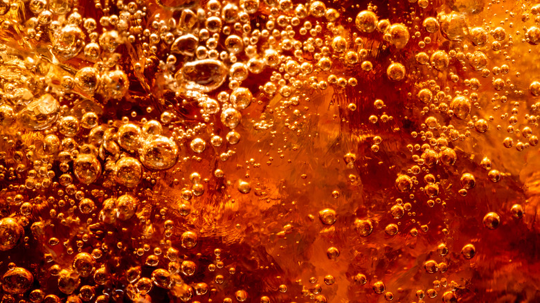 close-up of light brown carbonated beverage 