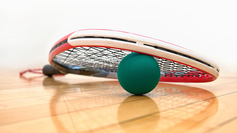 Racquetball equipment, a ball and racket