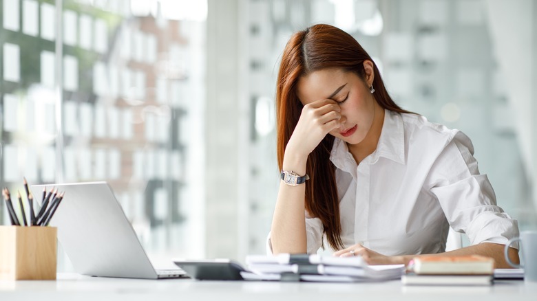 woman feeling side effects