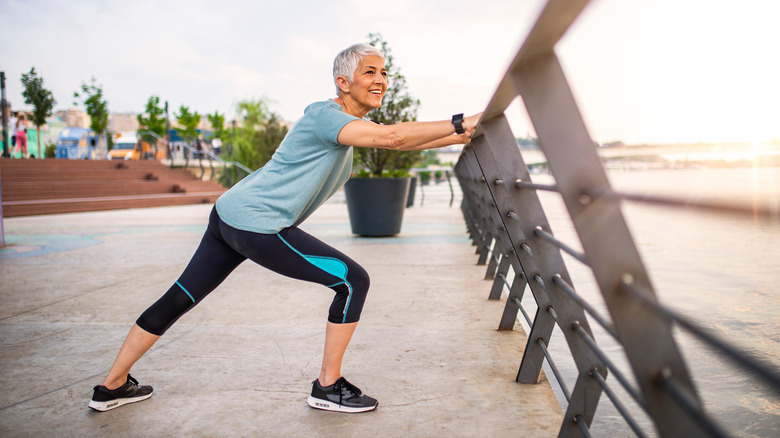 woman stretching legs