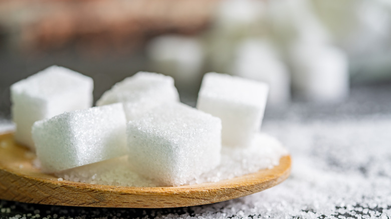 Sugar cubes on a spoon