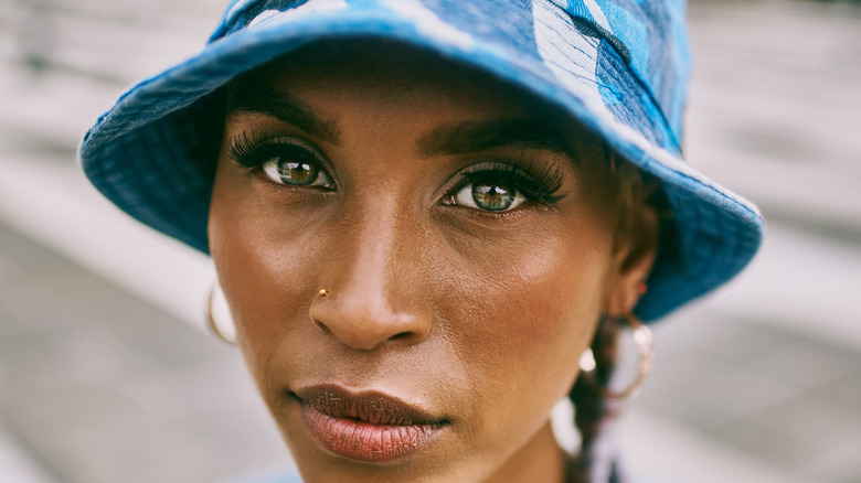 Woman with green eyes looking at camera