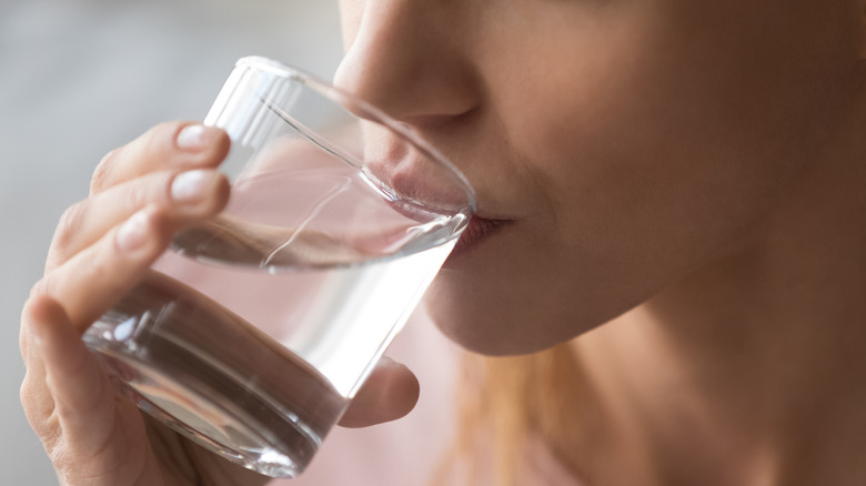 Woman drinking glass of water 