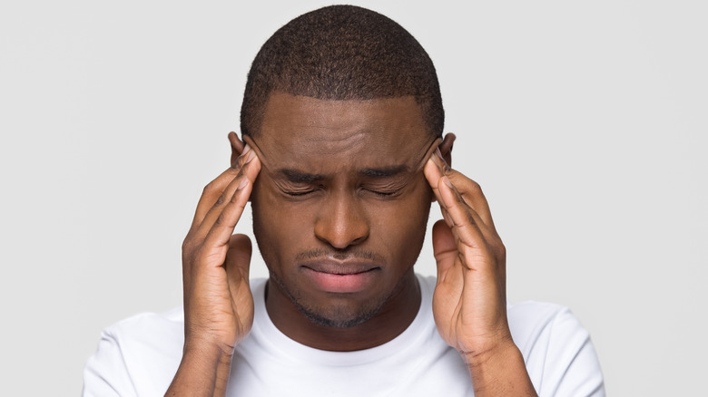 man with tension headache