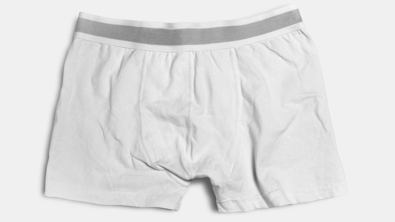 A pair of men's boxer briefs against a neutral background