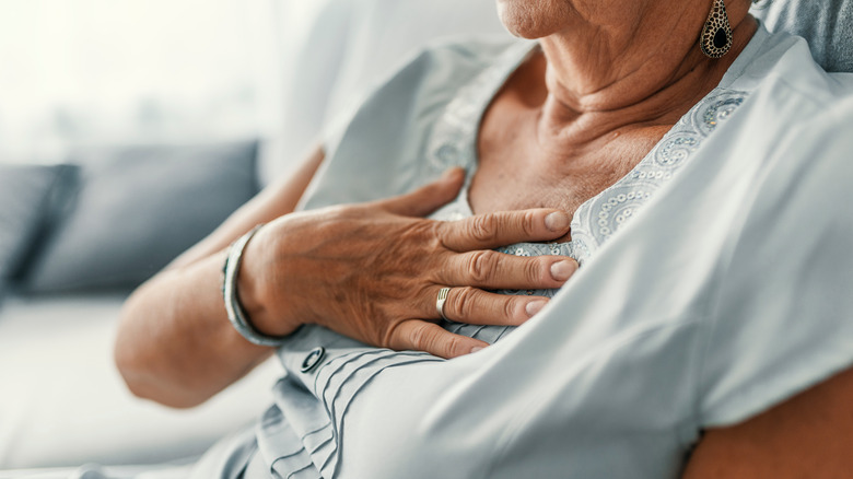 A woman suffers from heartburn