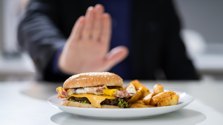 A man says no to a burger