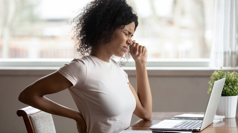 woman with back pain