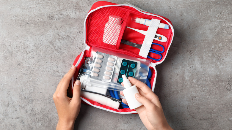 open first aid kit showing supplies