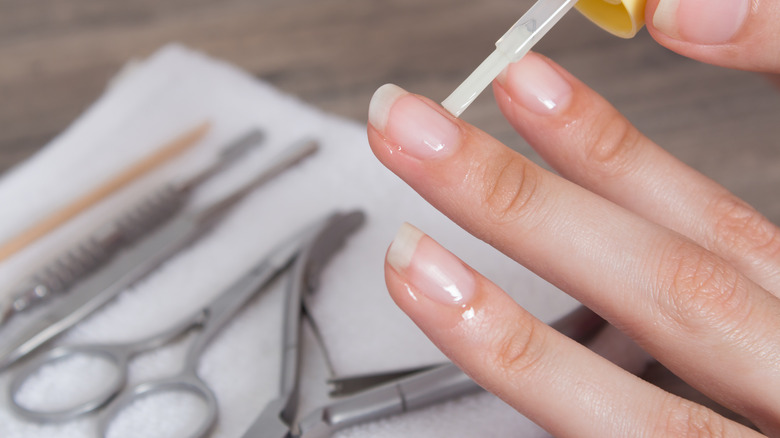 taking care of nails with proper tools