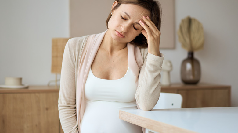Pregnant woman suffering from nausea