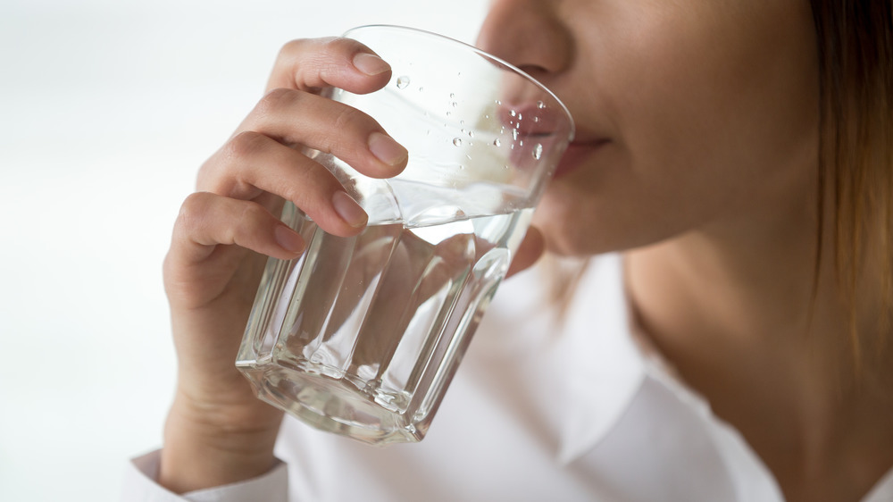 thirsty woman drinking water