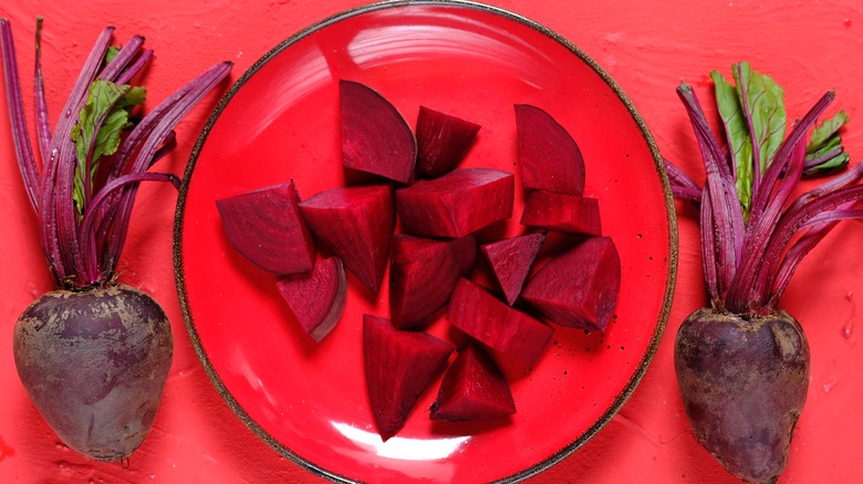 sliced beets next to whole beets