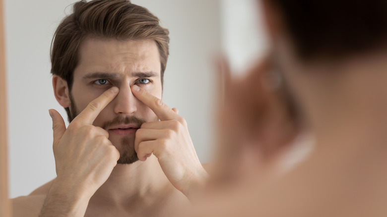 Man unhappy with dark circles