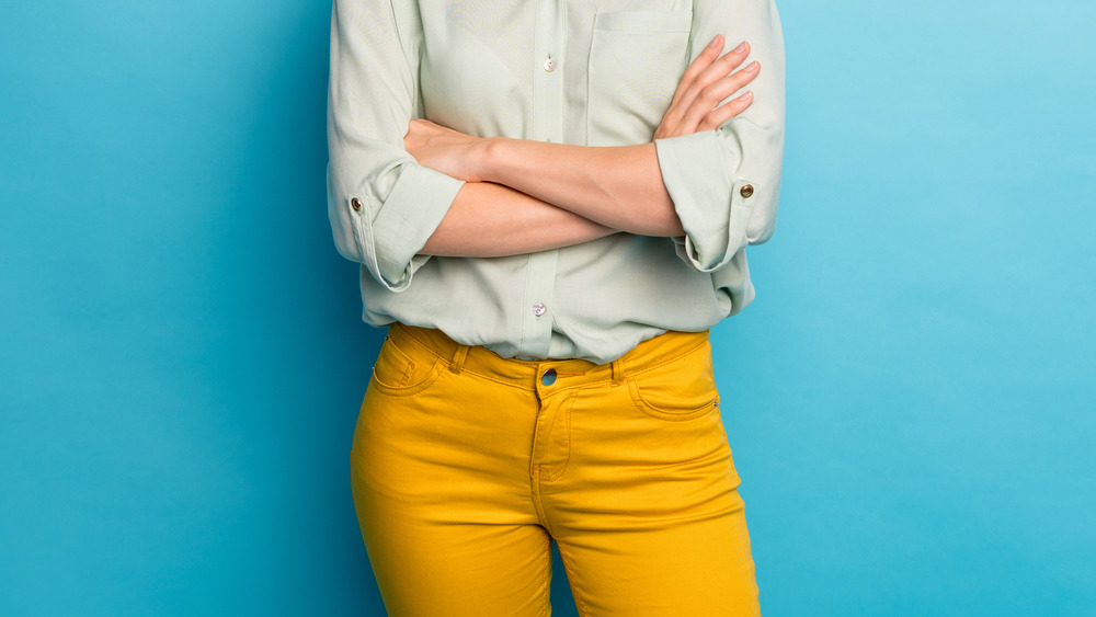 woman with yellow pants on