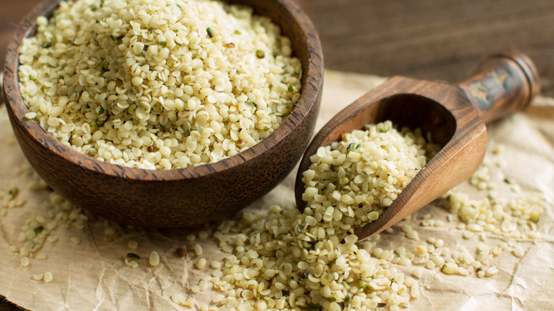 Hemp seeds in wooden bowl