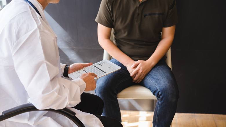 Man speaking with doctor about ED drugs
