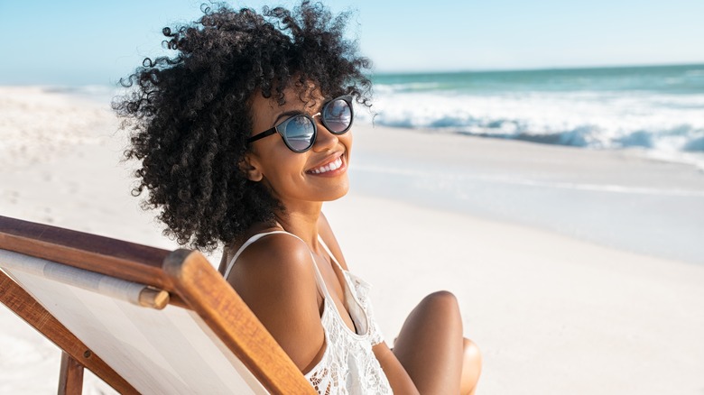 Woman relaxing on vacation at the beach