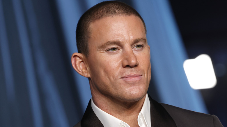 Channing Tatum smiling at an event for celebrities