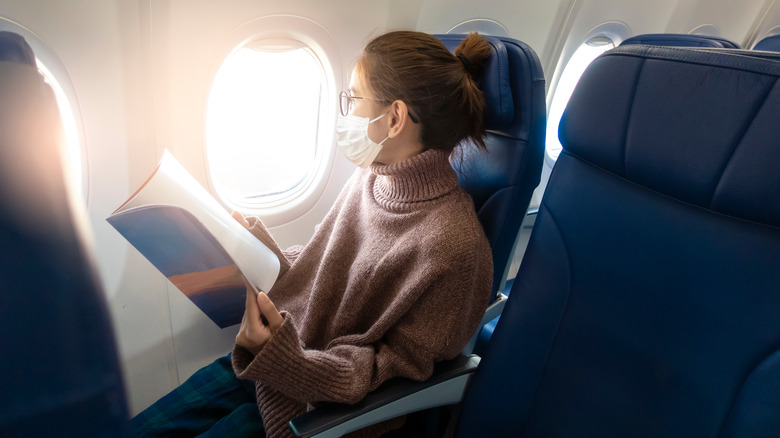 A woman in an airplane