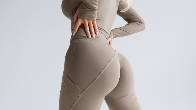 A model in a bodysuit