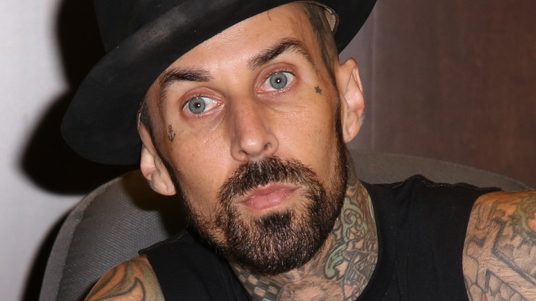 Travis Barker signing autographs