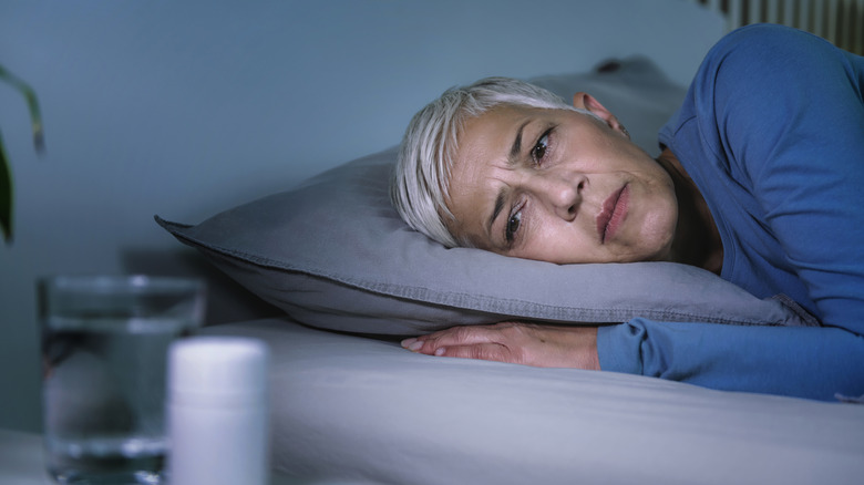 older adult having trouble sleeping