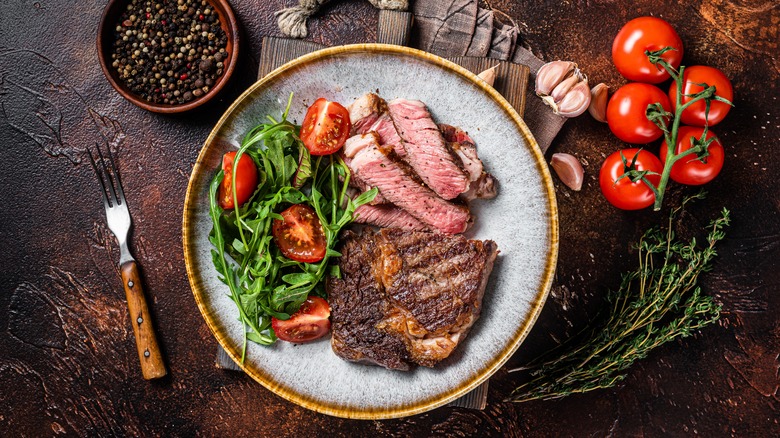 Plate of steak and salad