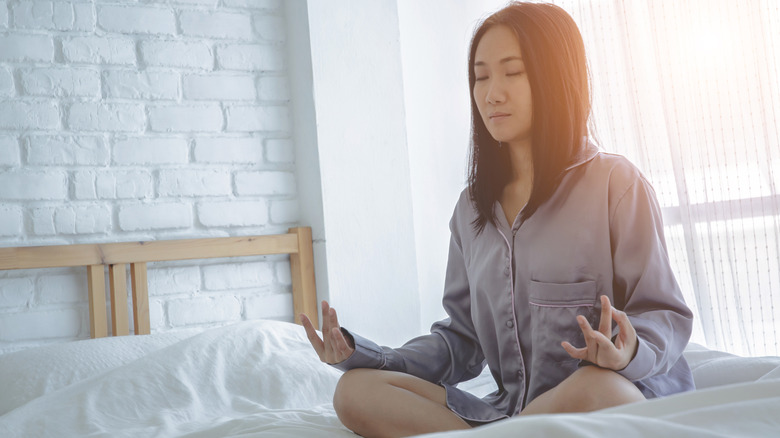 woman practicing deep breathing