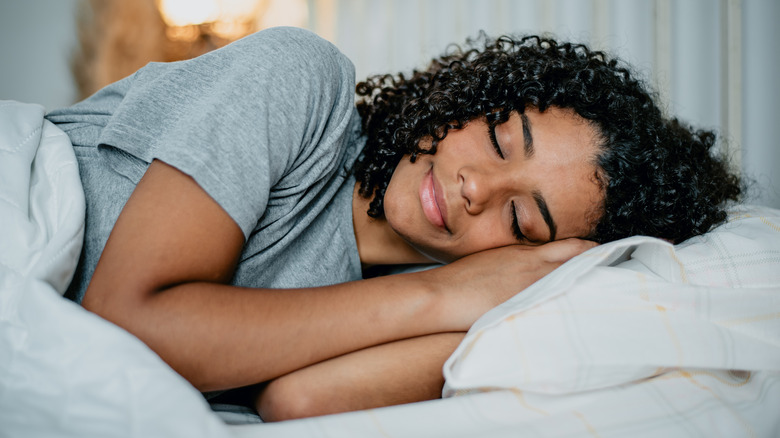 Woman sleeping in bed