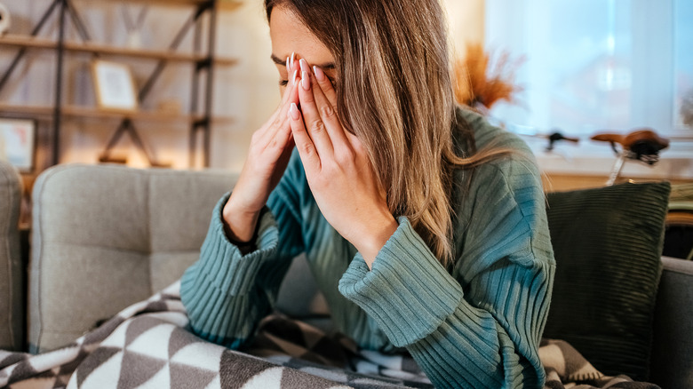 Woman feeling nausea coming on