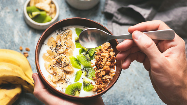 smoothie bowl with kiwi, banana, and granola