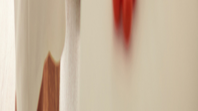 Men making a pasta meal in the kitchen
