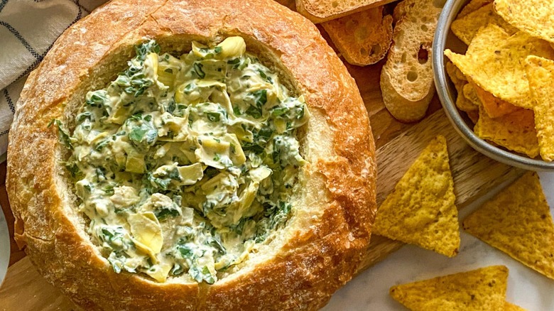 vegan spinach artichoke dip in bread bowl