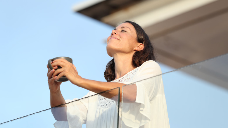 A woman soaks up sunshine