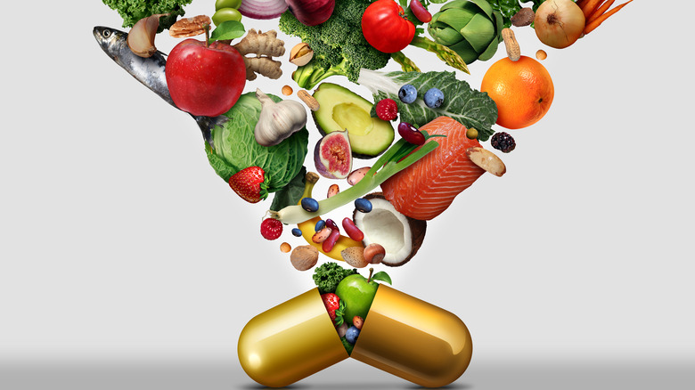 healthy foods being poured into capsule