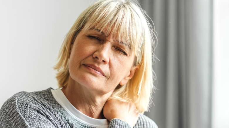 Woman with neck pain