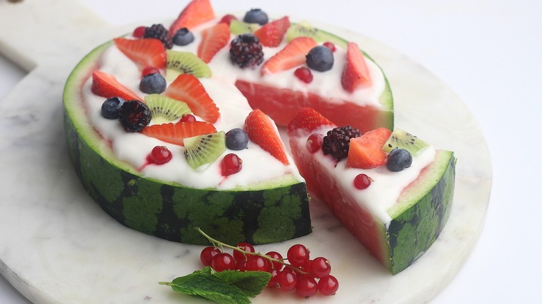 watermelon pizza on cutting board