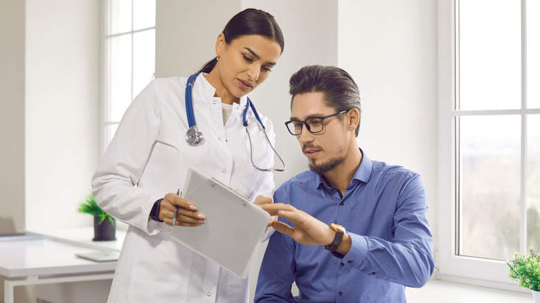 doctor consulting with a patient