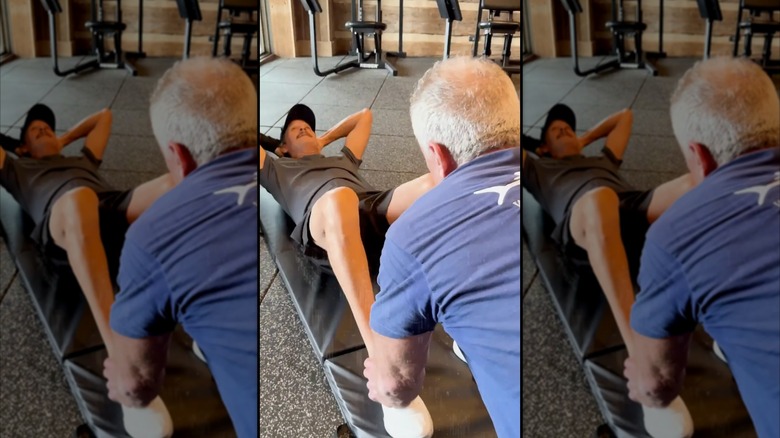 Kid Rock doing crutches in a video