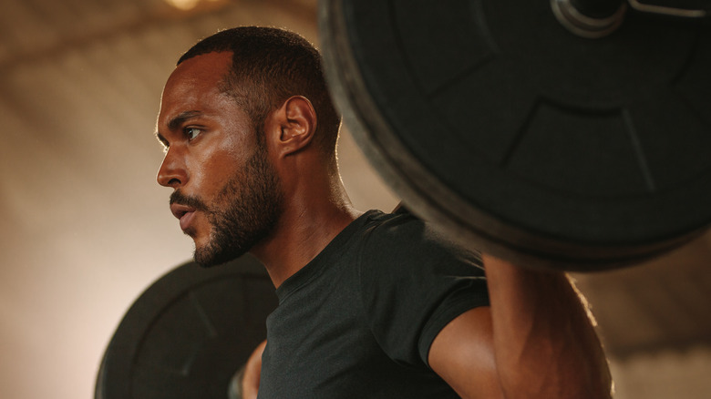 A man working out with a barbell