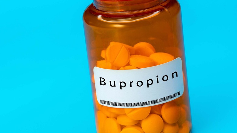 Close up pill bottle labeled bupropion