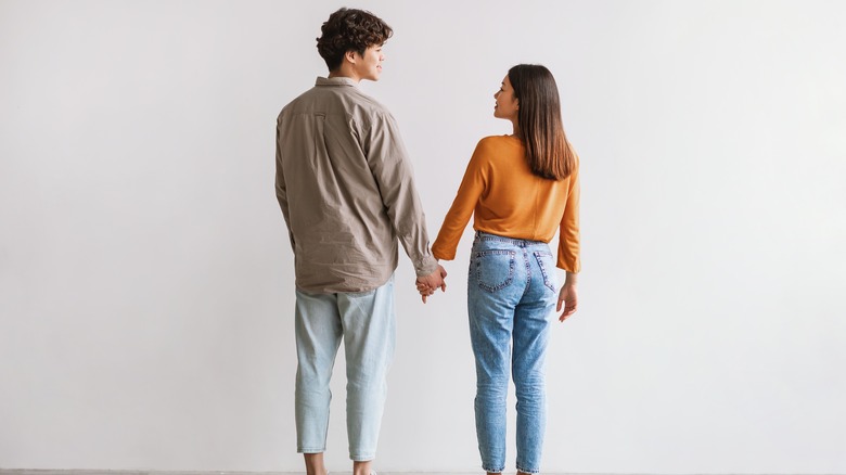 couple holding hands